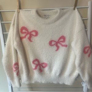 Hooked Up by IOT Cream Fuzzy Crewneck Sweater with Pink Bows
